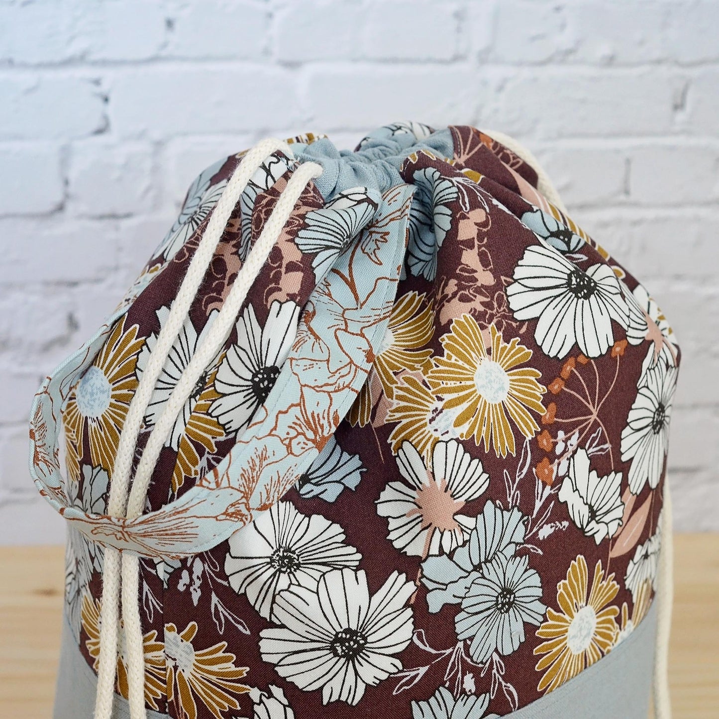 Large knitting bag with pockets and grab handle, made in beautiful floral fabric.  Made by Yellow Petal Handmade in Canada.