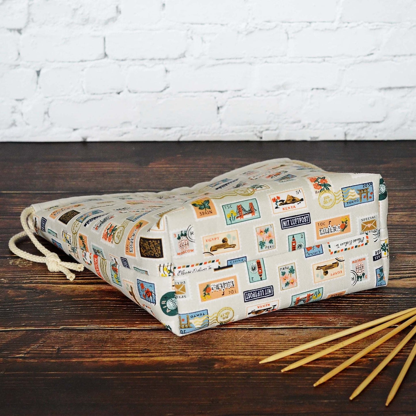 Postage Stamp patterned knitting project bag made from the Bon Voyage collection by Rifle Paper Co.  Made in Canada by Yellow Petal Handmade.