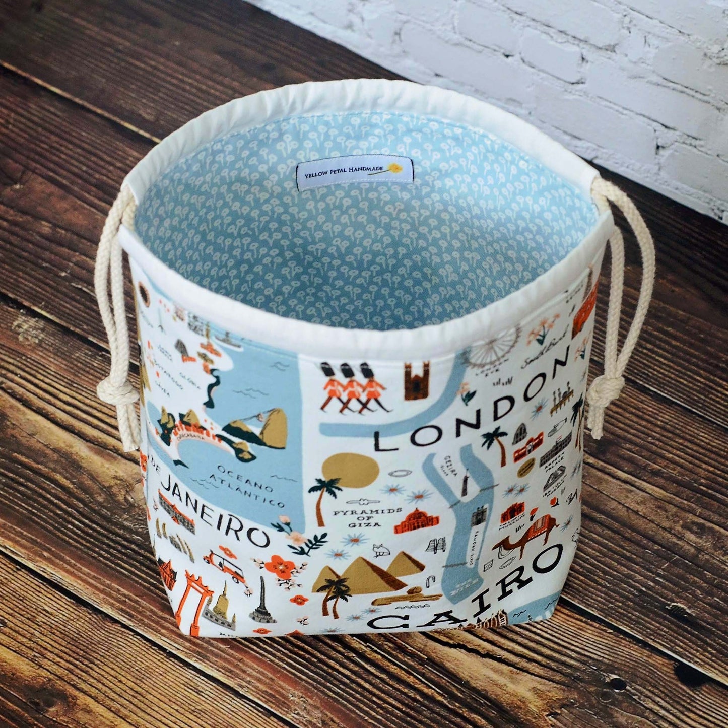 Small drawstring sock knitting bag in pretty travel fabric from the Bon Voyage collection by Rifle Paper Co.  Made in Canada by Yellow Petal Handmade.