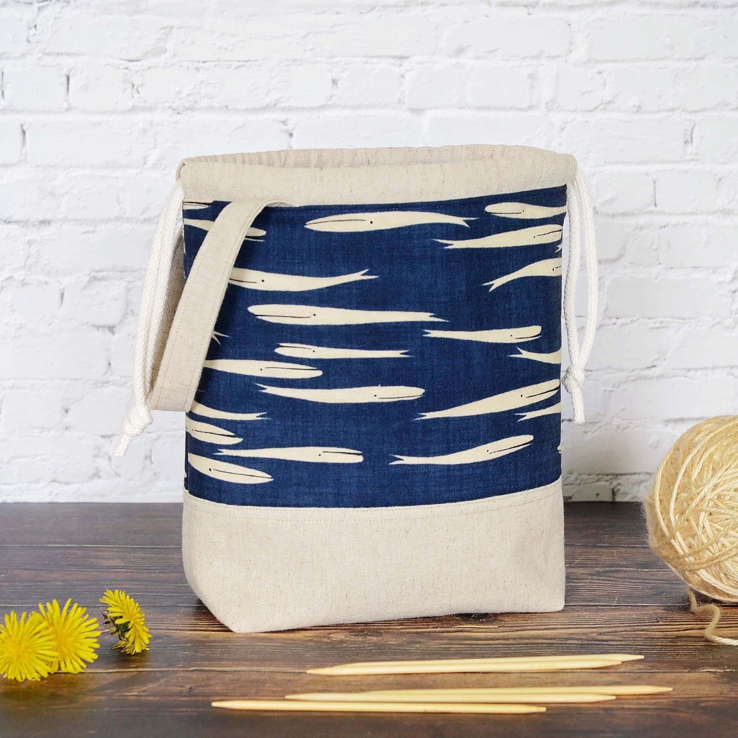 Whale themed project bag with drawstring and handle.  Made from cottons and linen by Yellow Petal Handmade.  On sale.