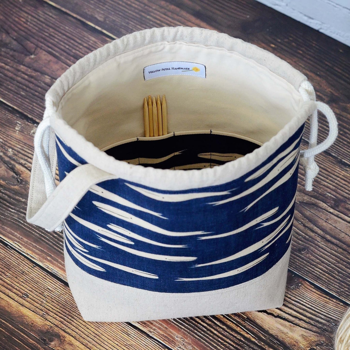 Whale themed project bag with drawstring and handle.  Made from cottons and linen by Yellow Petal Handmade.  On sale.